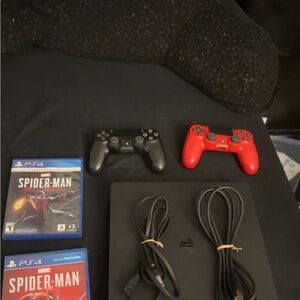 Sony PlayStation 4 with Black and Red Controllers